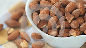 Healthy eating concept - almond on the white background