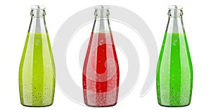 Healthy eating, drinks, diet and detox concept - close up of glass bottles with different fruit or vegetable juices on white