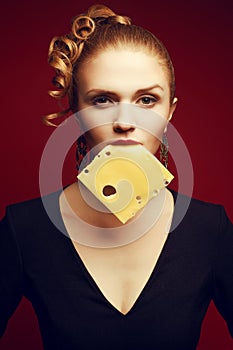 Healthy eating. Food concept. Arty portrait of woman with cheese photo
