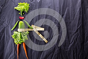 Healthy eating. Funny little woman made of the vegetables. With space for text