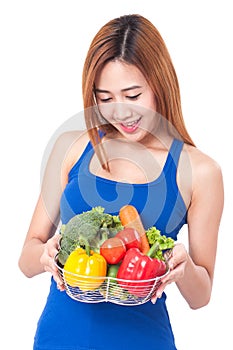 Healthy eating, happy young woman with vegetables