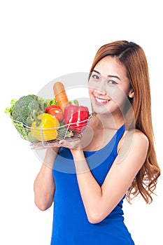 Healthy eating, happy young woman with vegetables
