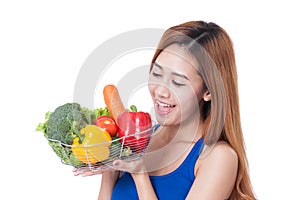 Healthy eating, happy young woman with vegetables