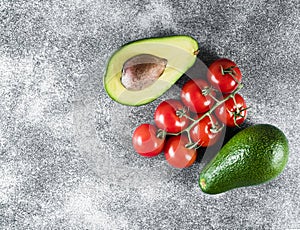 Healthy eating ingredients: fresh vegetables, avocado and tomato