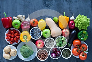 Healthy eating ingredients: fresh vegetables, fruits and superfood. Nutrition, diet, vegan food concept