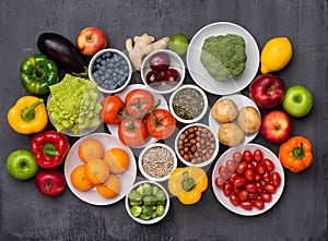 Healthy eating ingredients: fresh vegetables, fruits and superfood. Nutrition, diet, vegan food concept