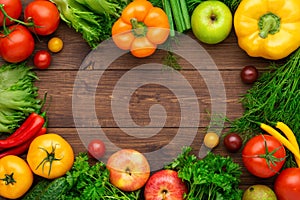 Healthy eating ingredients: fresh vegetables, fruits and superfood. Wooden background