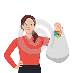 Healthy eating and lifestyle concept. Young smiling woman cartoon character standing with shopping bag