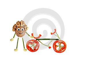 Healthy eating. Little funny walnut with bicycle.