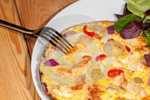 Healthy eating low calorie Spanish omelette meal with salad photo
