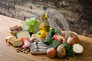 Healthy eating. Mediterranean diet. Fruit,vegetables, grain, nuts olive oil and fish photo