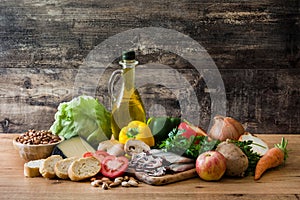 Healthy eating. Mediterranean diet. Fruit,vegetables, grain, nuts olive oil and fish photo