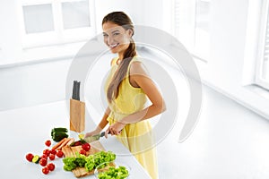 Healthy Eating. Woman Cooking Vegetable Salad. Diet, Lifestyle.