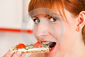 Healthy eating - woman with crispbread