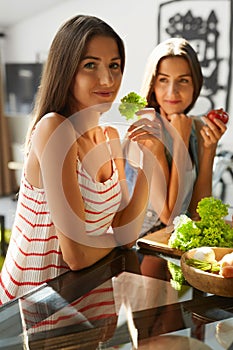 Healthy Eating Women Cooking Salad In Kitchen. Fitness Diet Food