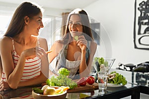 Healthy Eating Women Cooking Salad In Kitchen. Fitness Diet Food