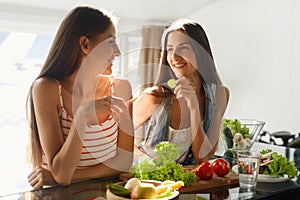 Healthy Eating Women Cooking Salad In Kitchen. Fitness Diet Food