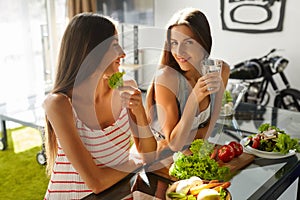 Healthy Eating Women Cooking Salad In Kitchen. Fitness Diet Food