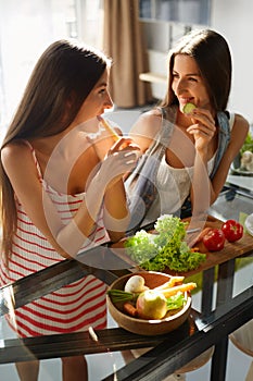 Healthy Eating Women Cooking Salad In Kitchen. Fitness Diet Food