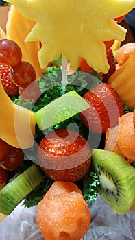 Healthy edible fruit arrangement