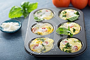 Healthy egg muffins, mini frittatas with tomatoes