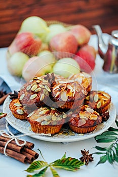 Healthy fall vegetarian dessert. Apple cupcake with pumpkin, almond seeds