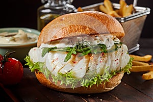 Healthy fish burger with mayonnaise