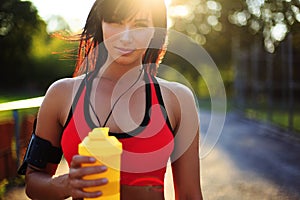 Healthy fitness girl with protein shake. photo