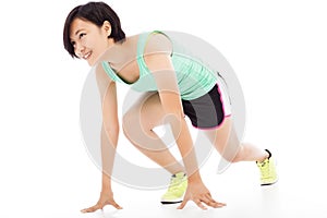 Healthy and fitness woman running over white background.