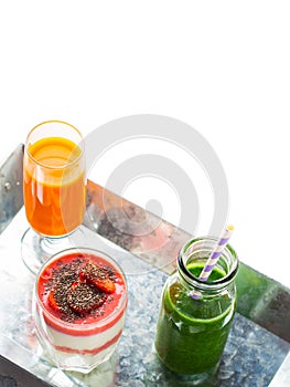 Healthy food concept green smoothie yogurt fruit juice breakfast