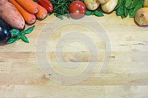 Healthy Food concept with vegetables on wooden table.