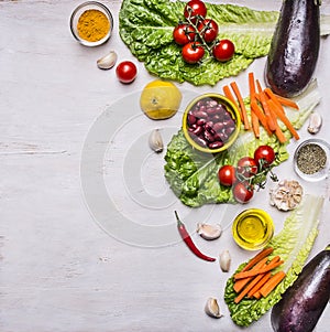 Healthy food and diet nutrition concept, fresh vegetables, border, place for text on wooden rustic background top view vegetarian