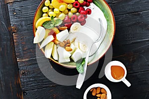 Healthy food diet top view fruit breakfast natural yoghurt bowl