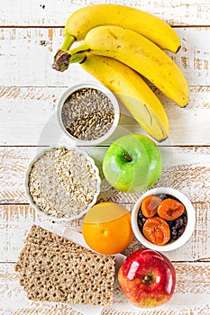 Healthy Food Fiber Source Breakfast Oatmeal Fruits Apples Green Red Bananas Orange Milk Thistle, Rye Bran Scandinavian Crispbread