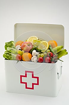 Healthy food. First aid box filled with fruits and vegetables.