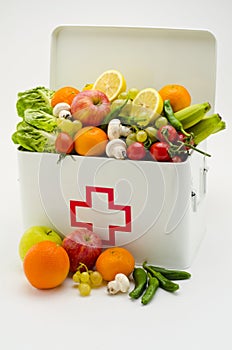 Healthy food. First aid box filled with fruits and vegetables.