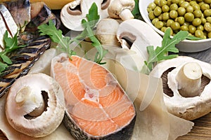 Healthy food, foods rich in vitamin D, omega 3 and protein, sea red salmon, smoked mackerel, mushrooms, champignons