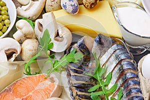 Healthy food, foods rich in vitamin D and protein, chicken quail eggs, butter, sea fish salmon mackerel, dairy products