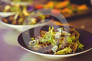 Healthy food. Fresh salad with quinoa and paprika on a plate. restaurant serving. Background image, copy space