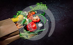 Healthy food in full paper bag of different products vegetables and fruits
