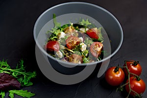 Healthy food. Greek salad with cucumber, tomato, sweet pepper, lettuce and feta cheese. Top view, copy space