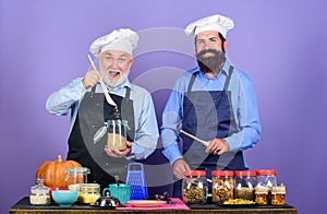 Healthy food is healthy life. Chef men cooking. Healthy food cooking. Halloween pumpkin recipe. bearded men in kitchen