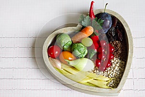 Healthy food in heart and cardiogram diet concept