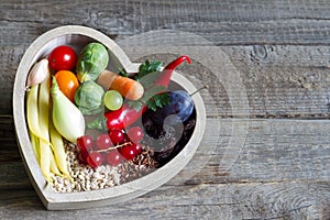 Healthy food in heart diet concept on vintage boards