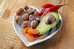 Healthy food in heart shaped plate