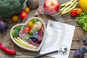 Healthy food in heart stethoscope and medical prescription diet and medicine concept
