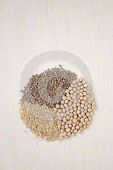 Healthy food ingredients: wholegrain rice, lentils and chickpeas. Healthy and balanced diet.