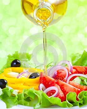 Healthy food lifestyle. Fresh salad with oil