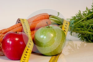 healthy food with measuring tape photo