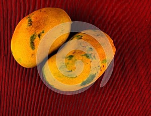 Healthy food: mix from dried figs and dates in white bowl on red cloth napkin on table, closeup , selective focus